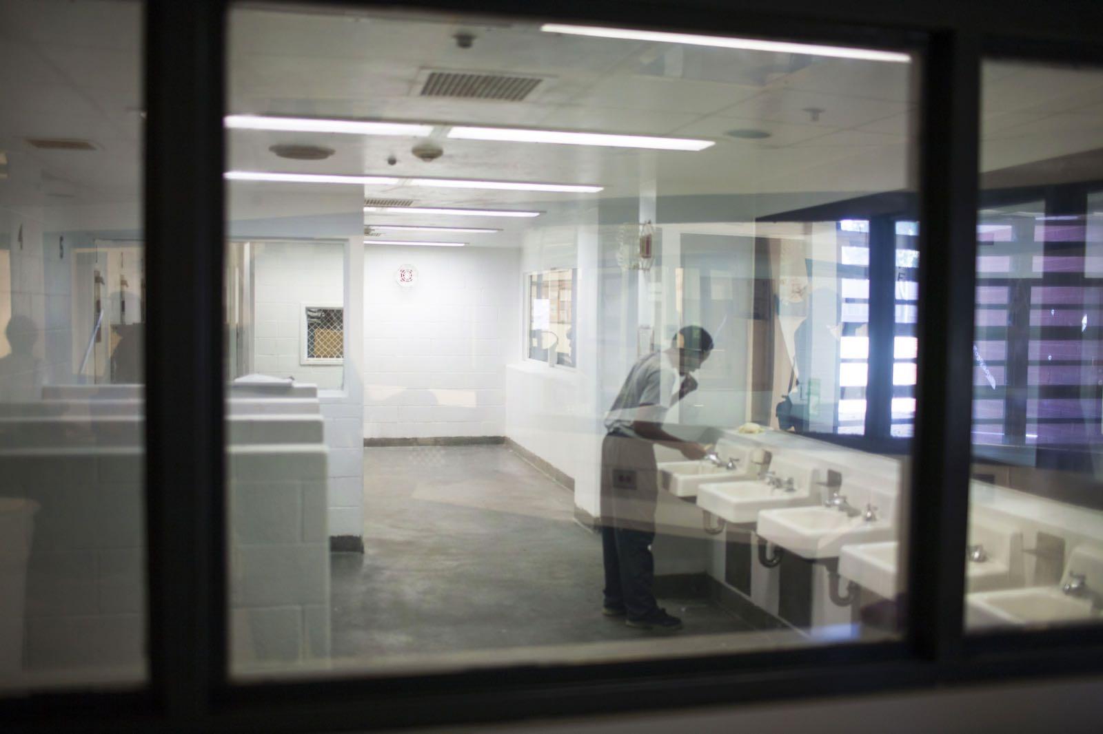 Sylmar bathroom behind glass wall