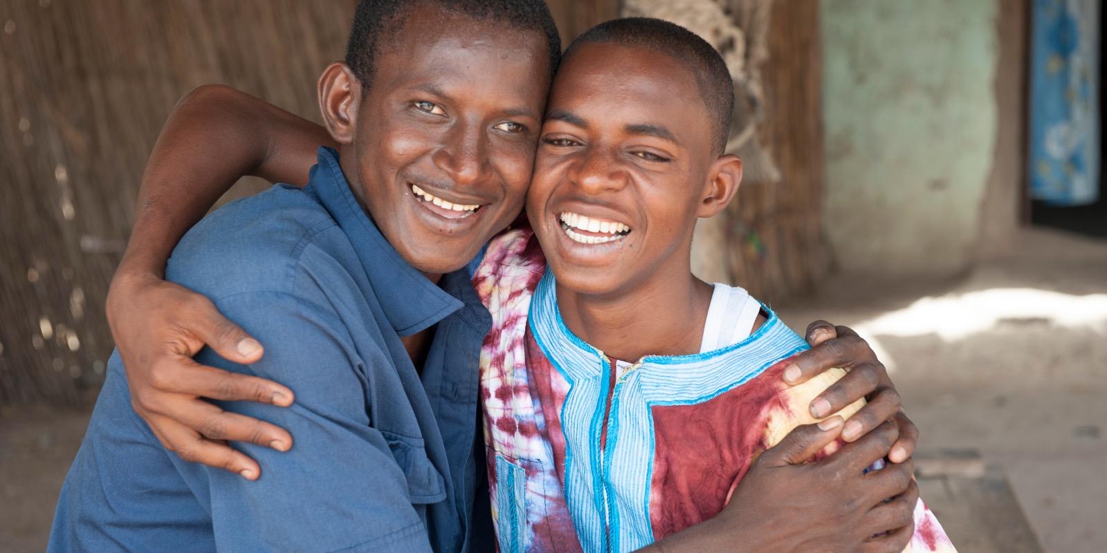 Two boys hugging eachother