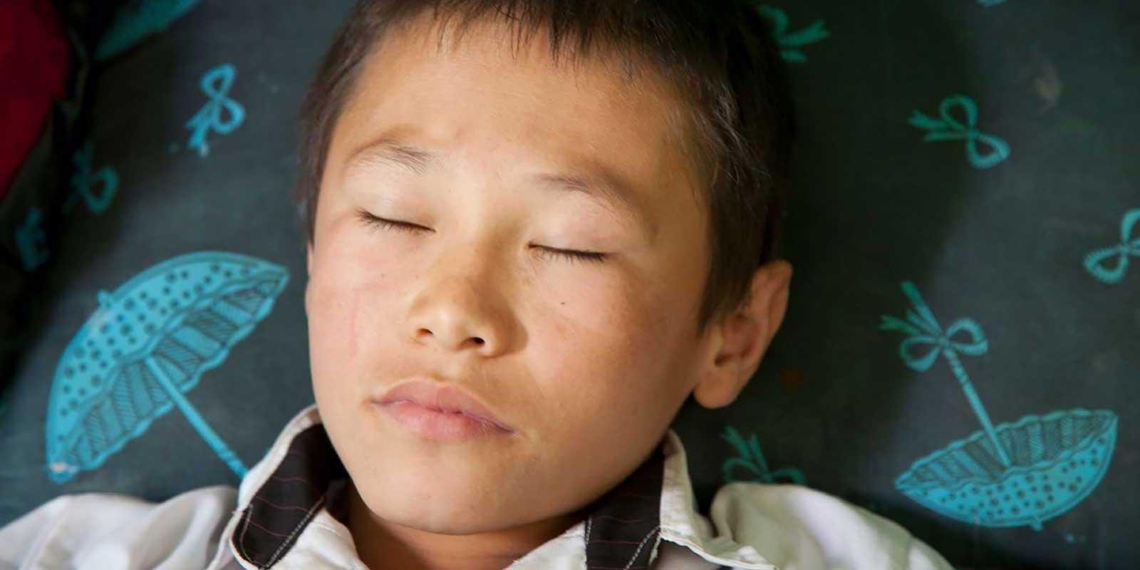 Boy sleeping.