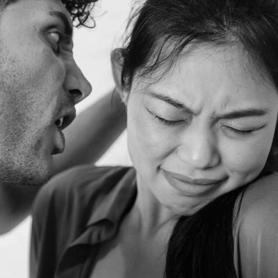 Man screaming and threatening young woman.