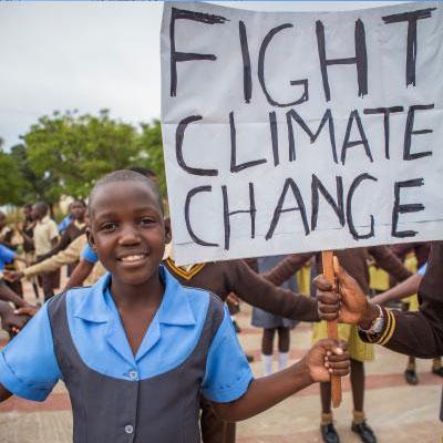 Girl sign against climate change.