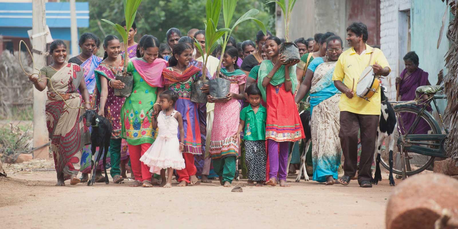 Villagers marching and playing music