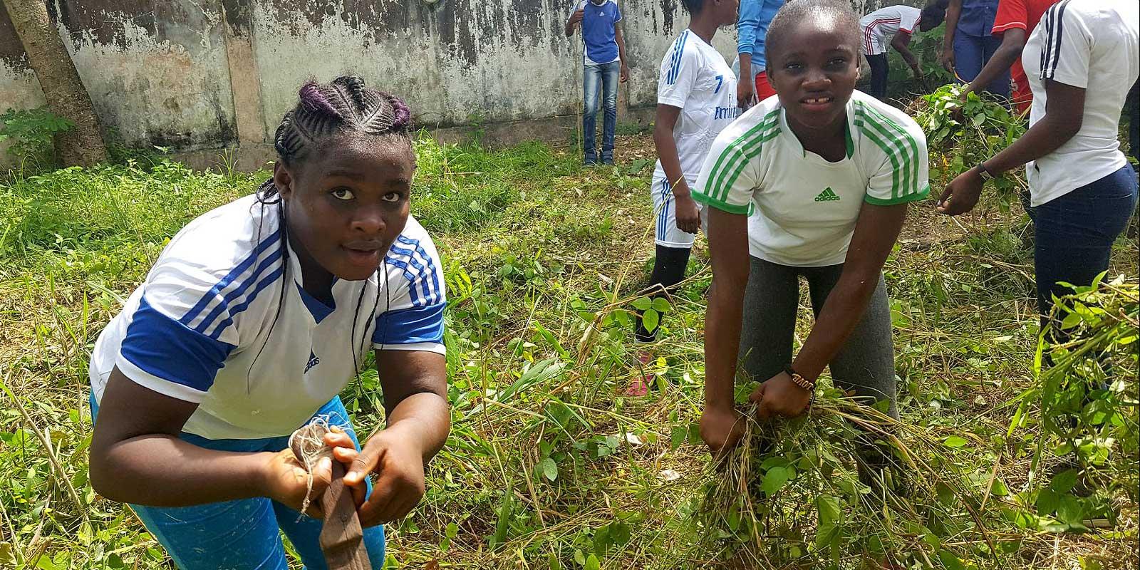 children collecting litter