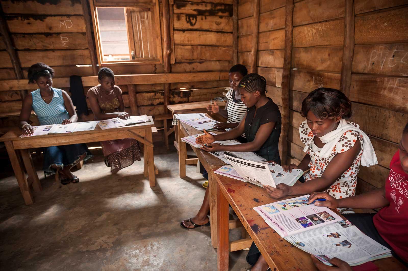Girls studying the Globe