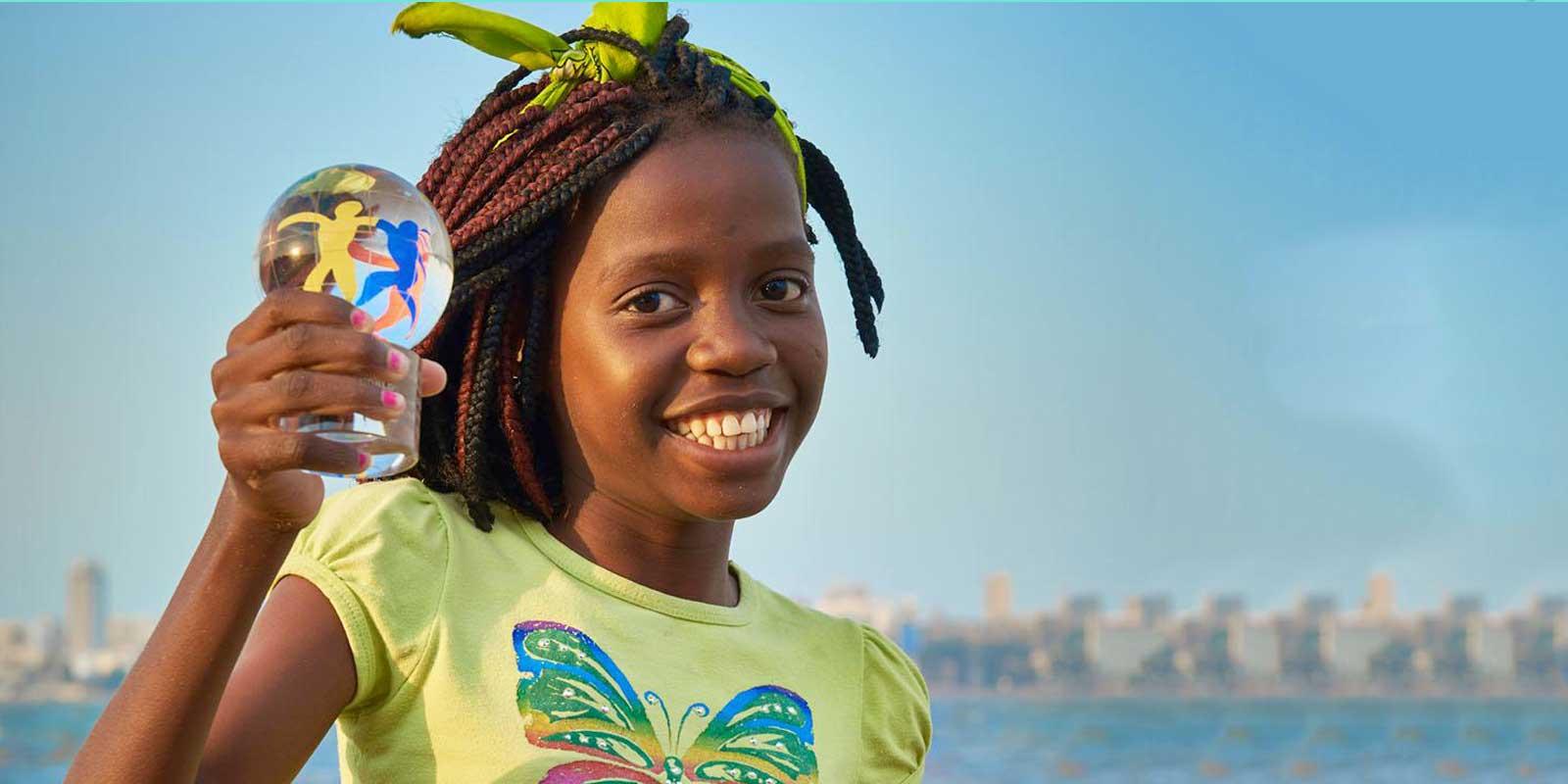 Girl holding crystal