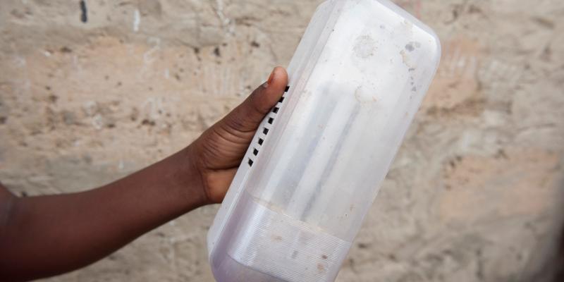 hand holding solar panel