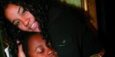 Idalmin Santana hugs a friend