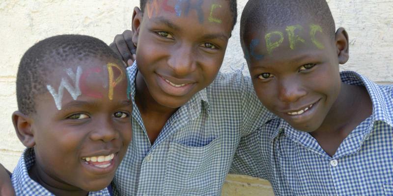 three children with facepaint