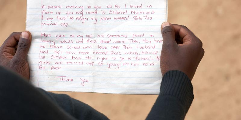 Hands holding a letter