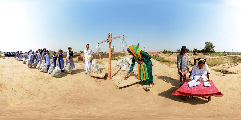 Children in Pakistan weighing litter