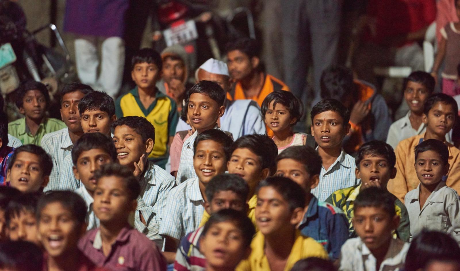 children watching a play