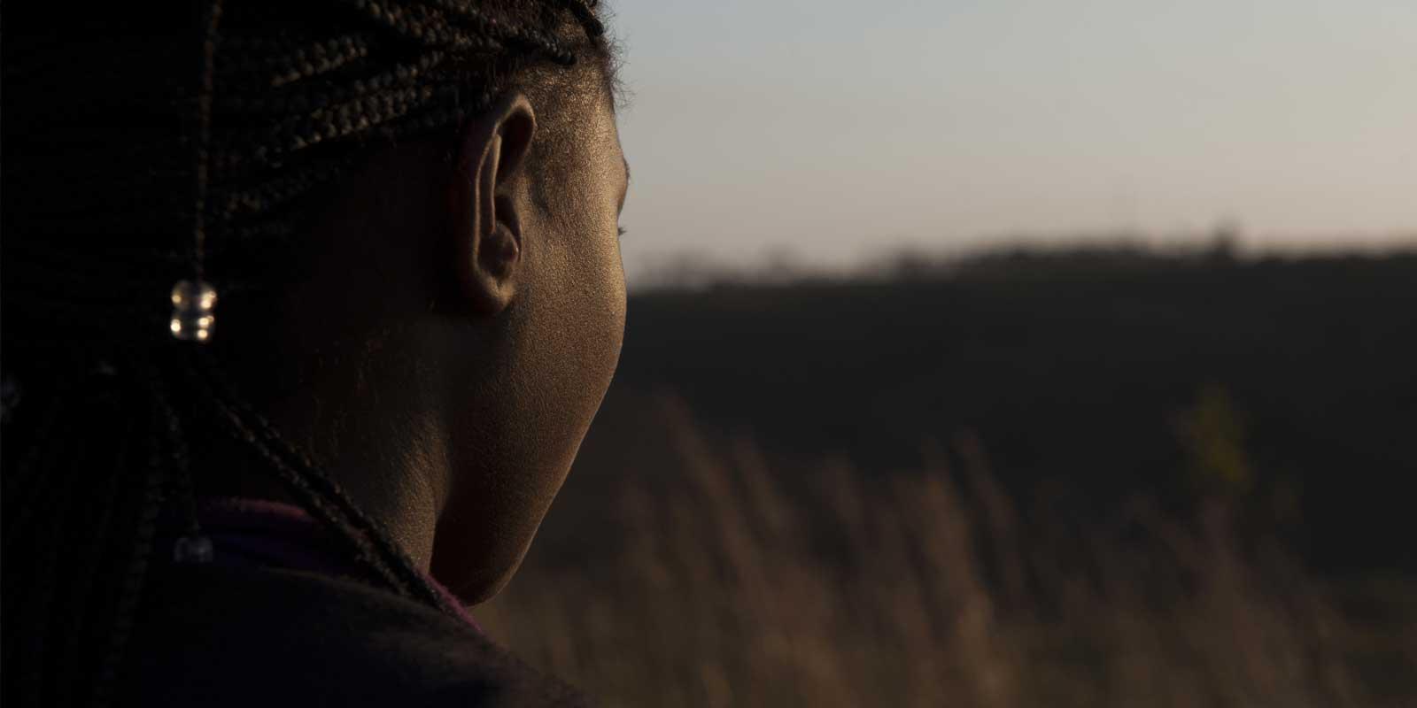 A girl seen from the side