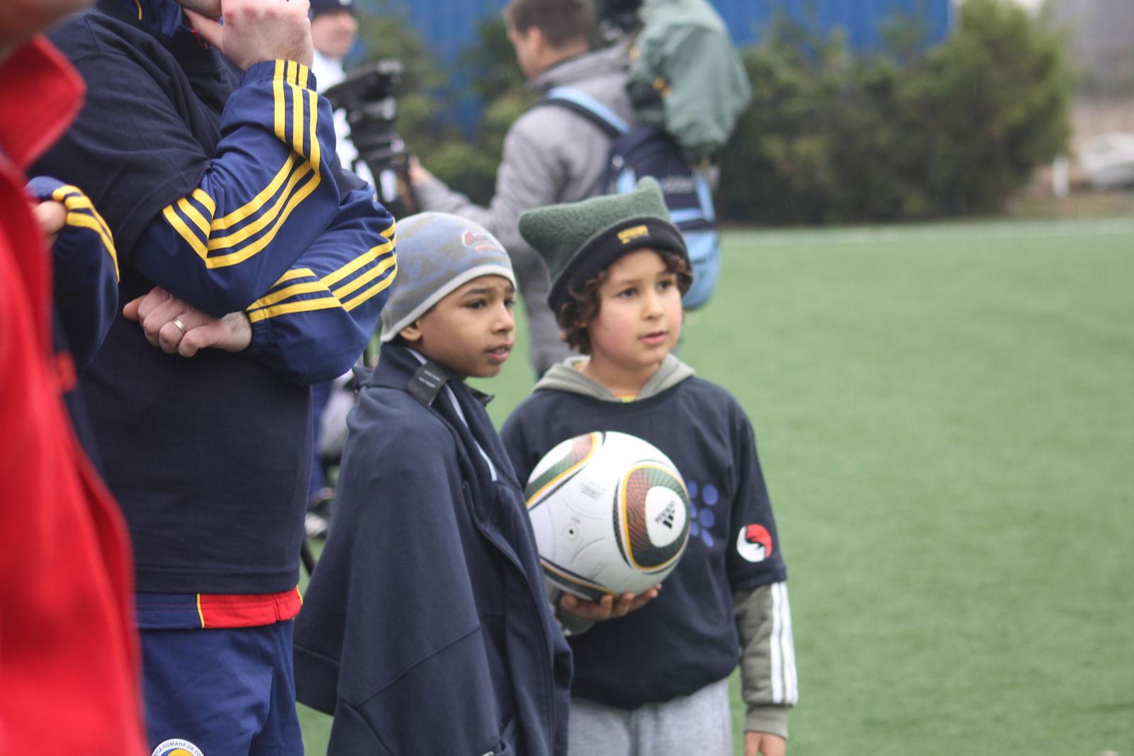 Toto with friend at football practice