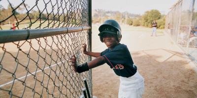 Valiant standing on a baseball field