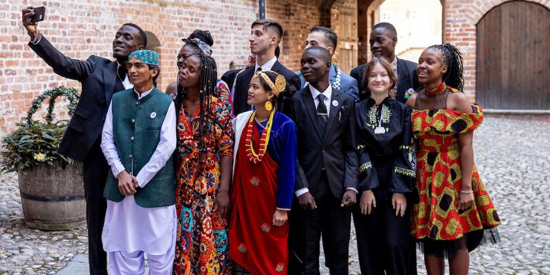 Children take a selfie together. 