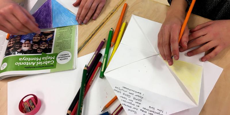 Hands writing and drawing 