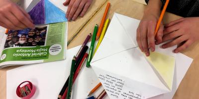 Hands writing and drawing 