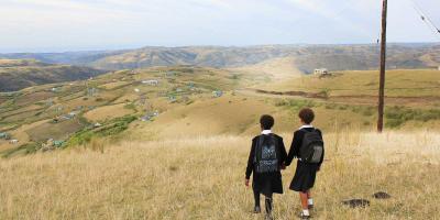 Zinath and friend walking in landscape